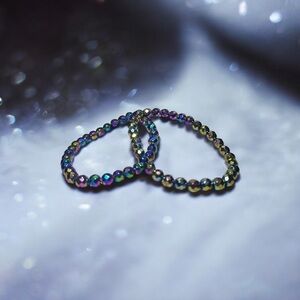 1 Aura Coated Hematite Faceted 6mm Bracelet